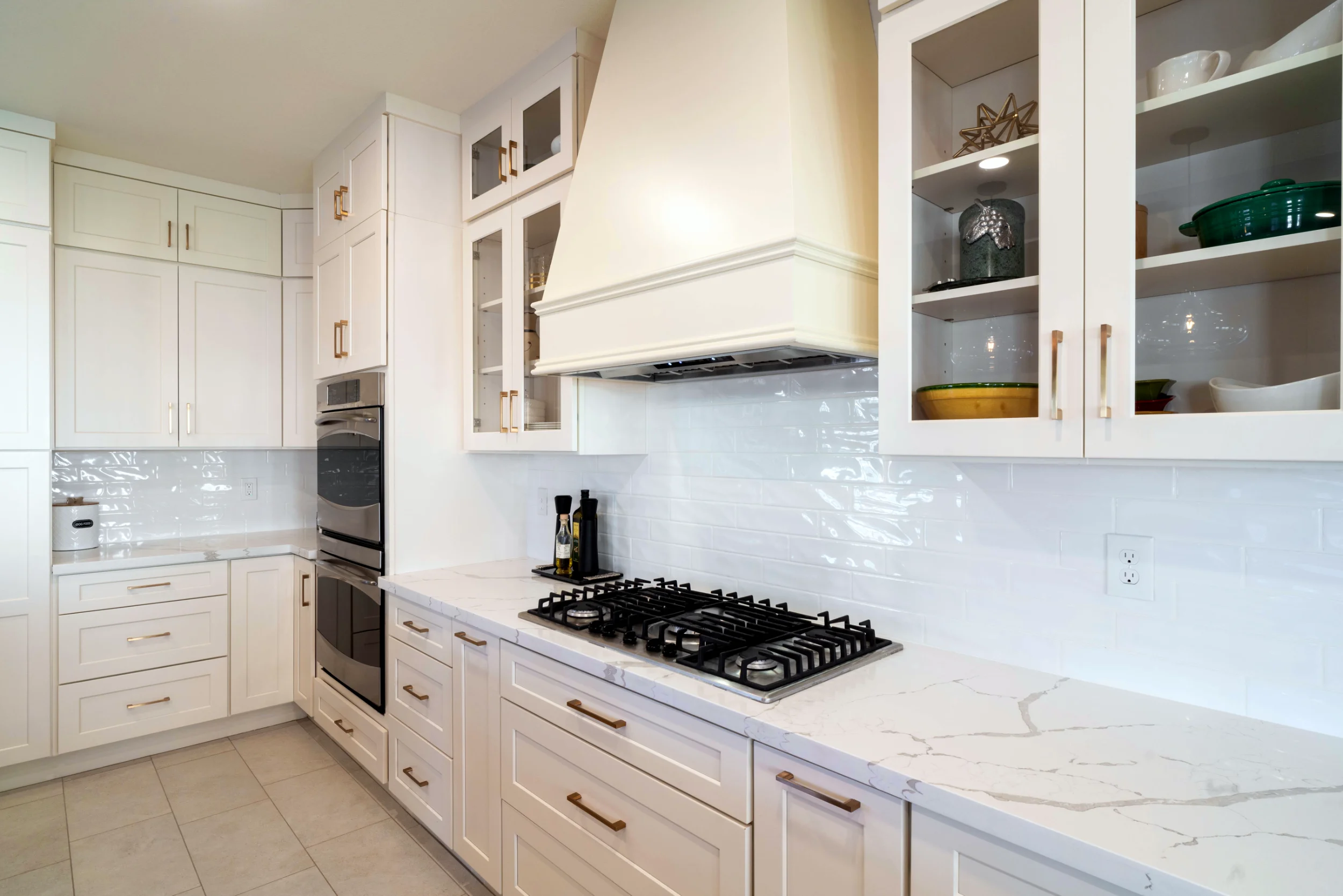 Premium white cabinetry and beveled backsplash