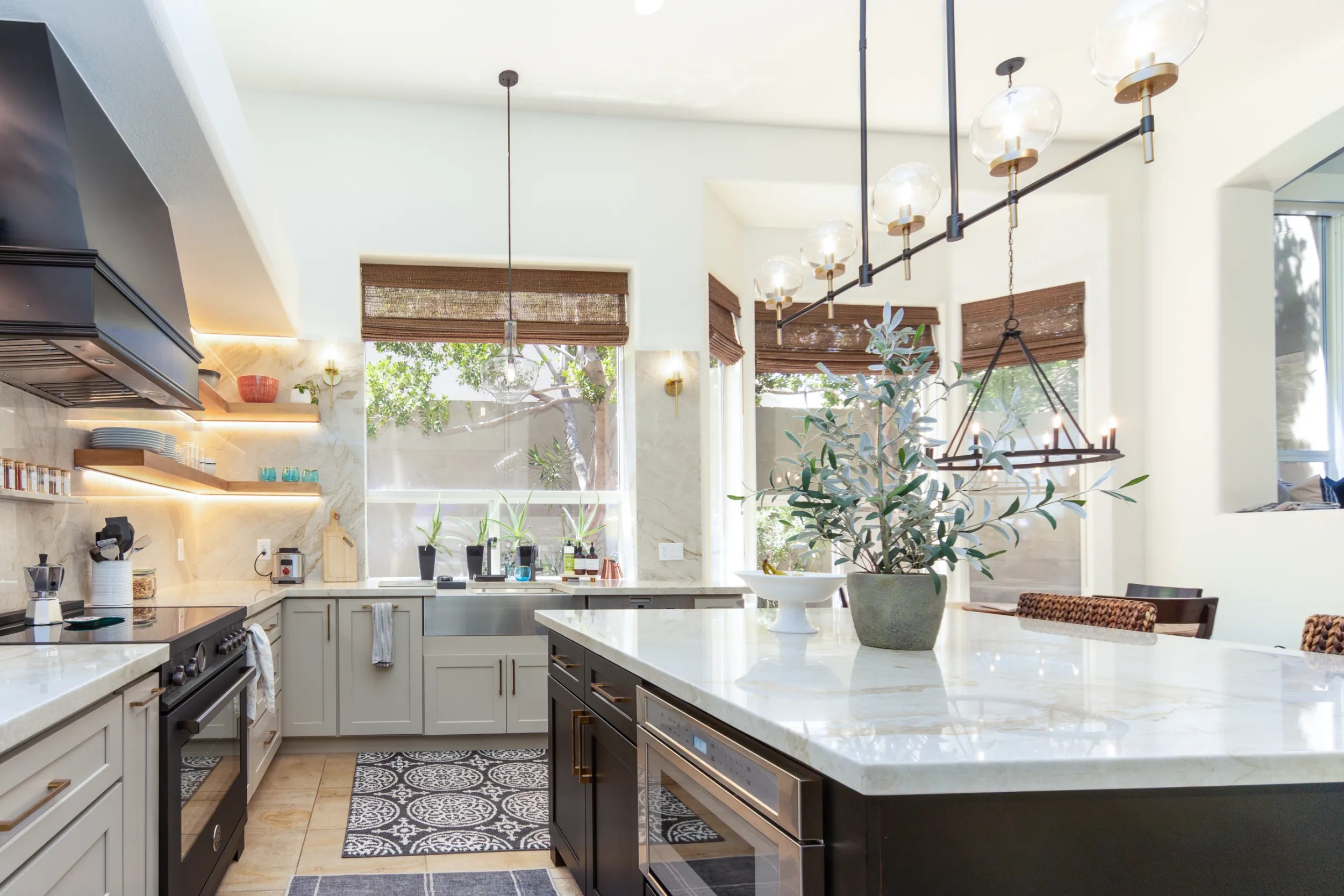 Large kitchen island with integrated cabinets and microwave